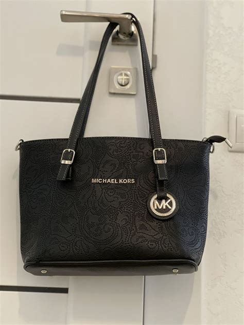 geanta michael kors breloc stea|gentii Michael Kors.